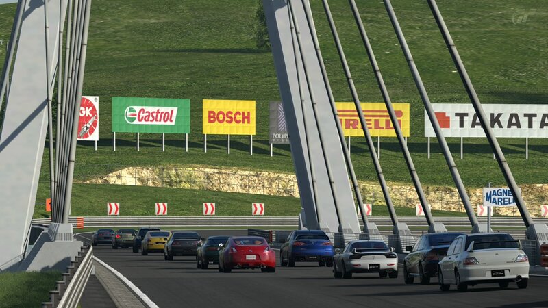 race cars on a bridge