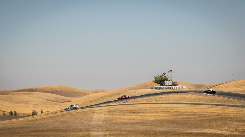 Race cars on a desert track