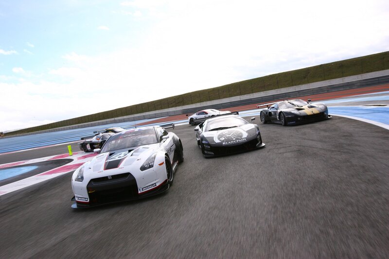 Race cars on a track