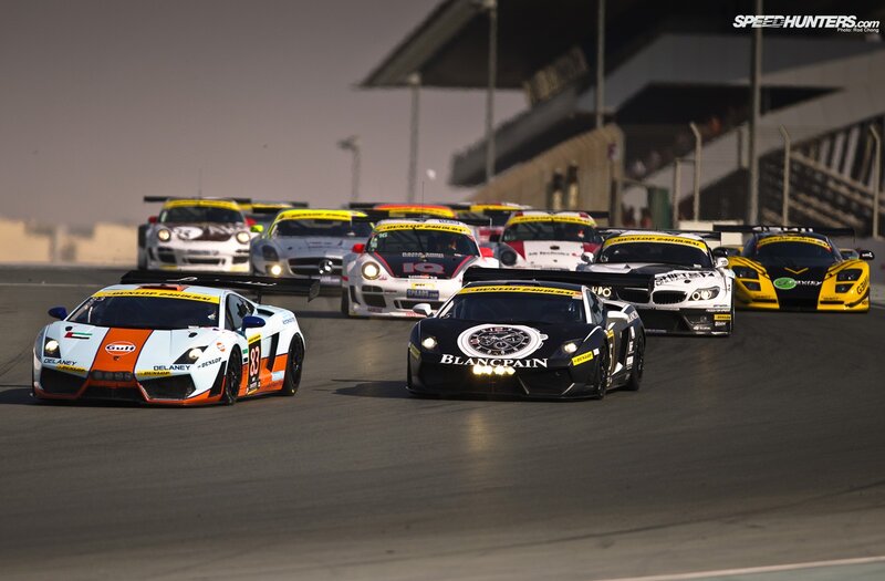 Race cars on a track