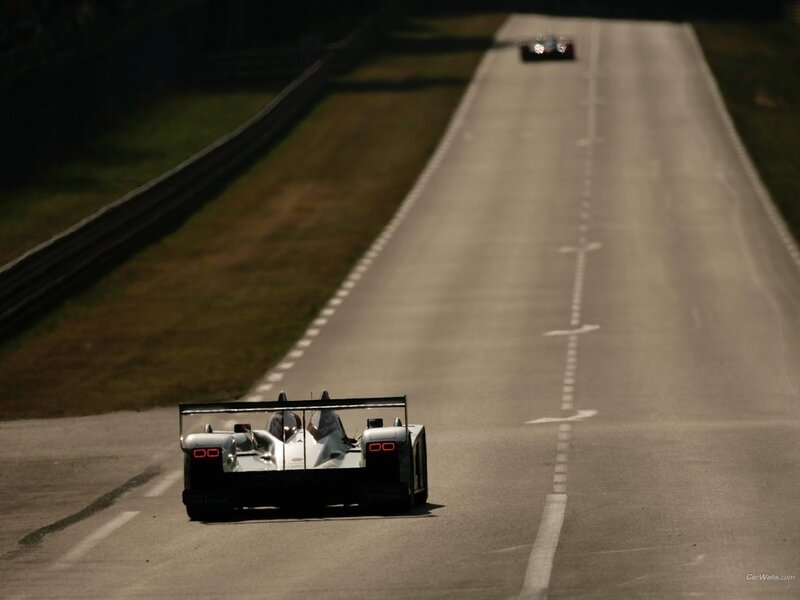 Race cars on a track