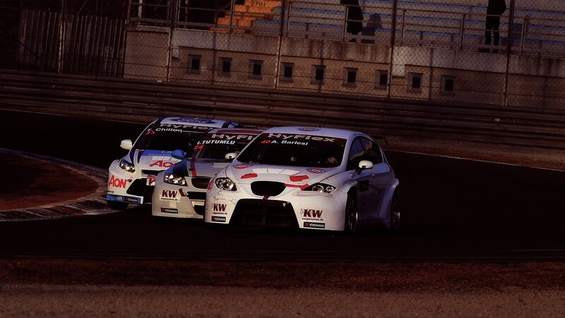 Race cars on a track