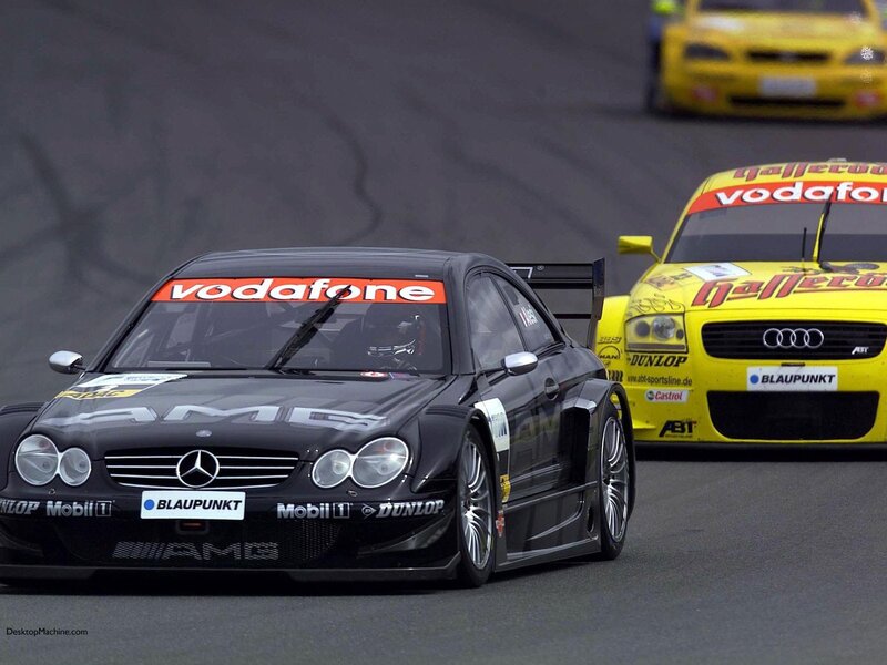 Race cars on a track