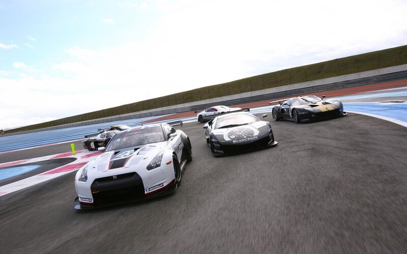 Race cars on a track