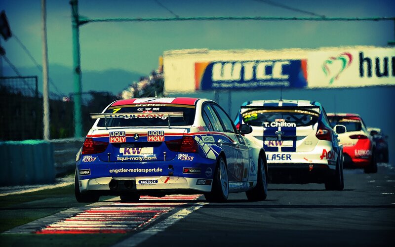 Race cars on a track