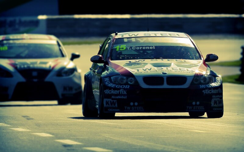 Race cars on a track