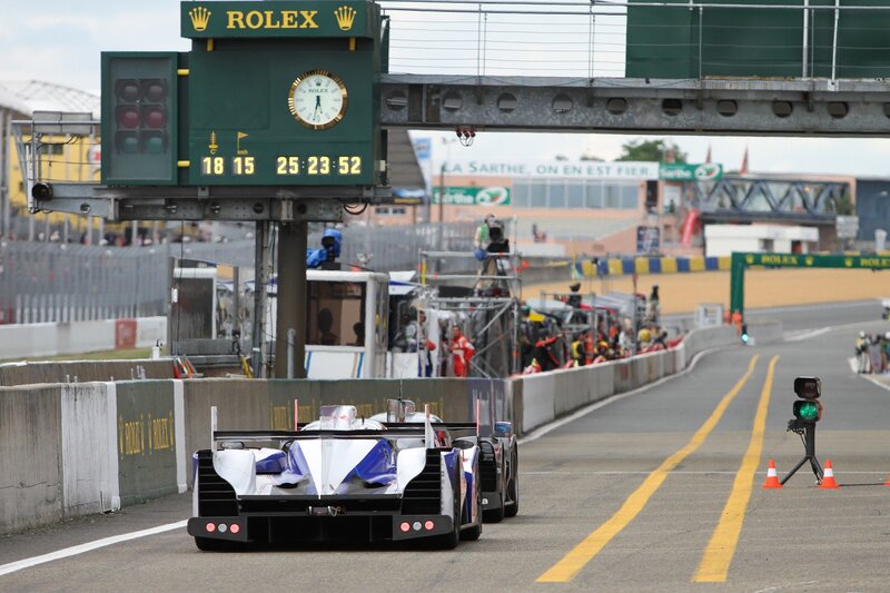 Race cars on a track
