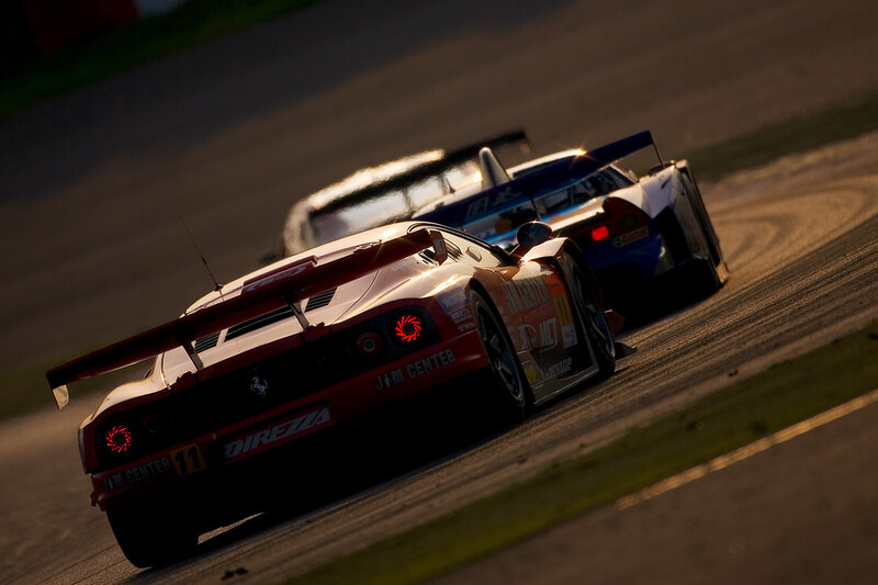 Race cars on a track
