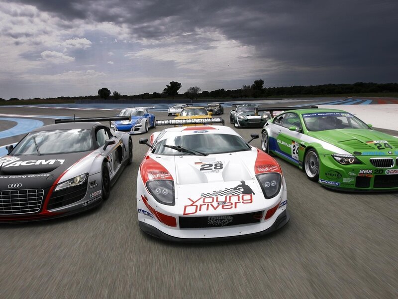 Race cars on a track