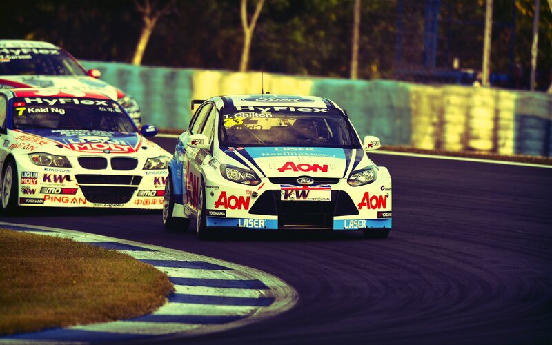 Race cars on a track