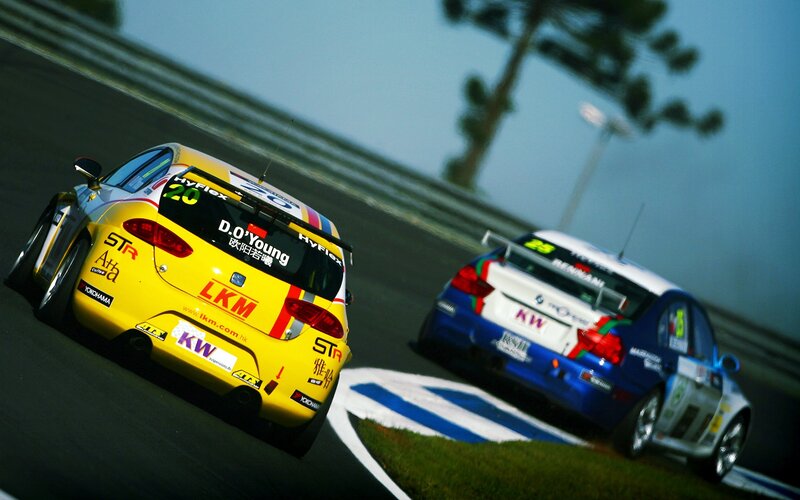 Race cars on a track