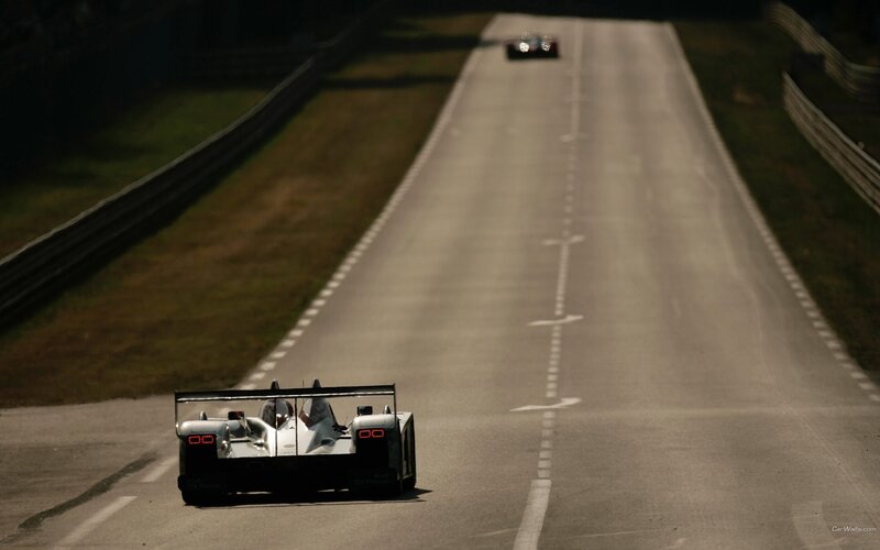 Race cars on a track