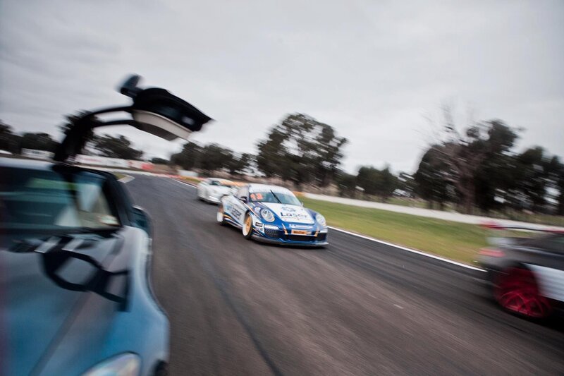 Race cars on a track