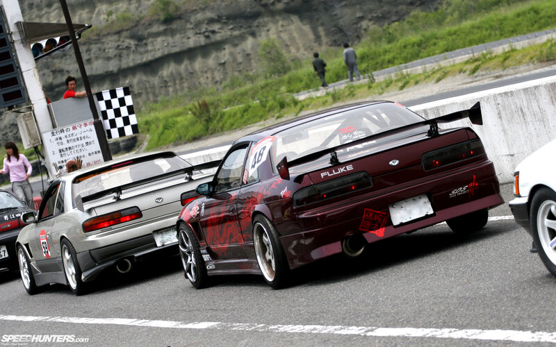 Race cars on a track