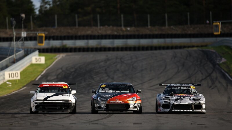Race cars on a track