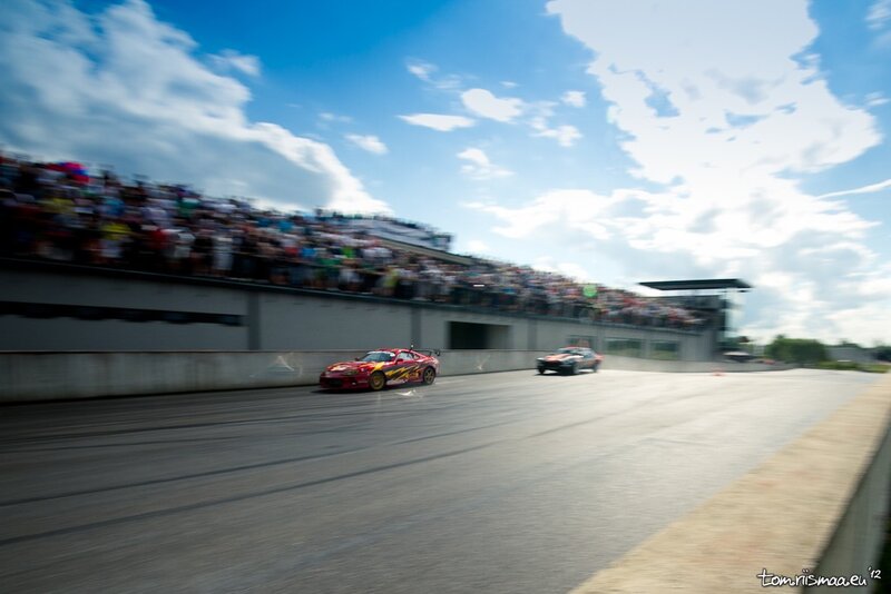Race cars on a track