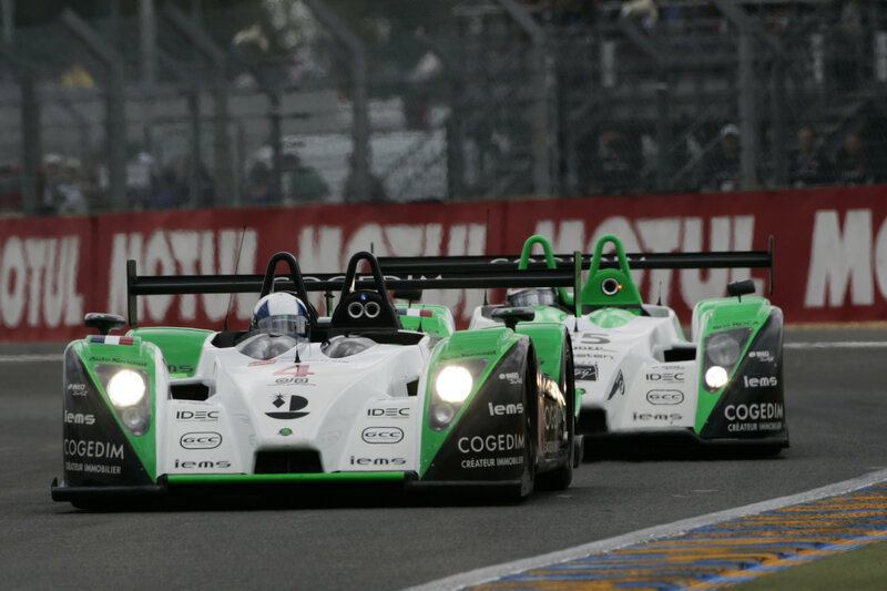 Race cars on a track