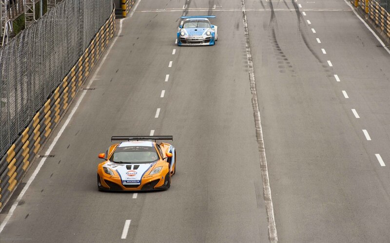 Race cars on a track