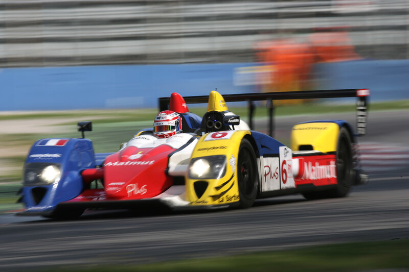 Race cars on a track