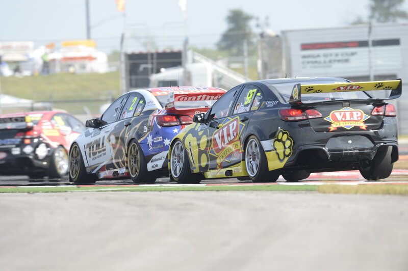Race cars on a track
