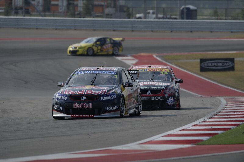 Race cars on a track