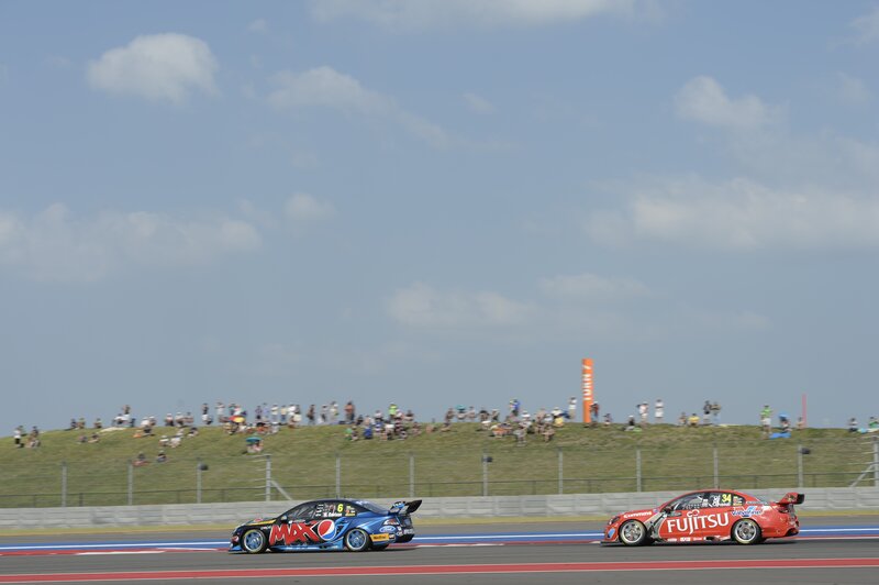 Race cars on a track