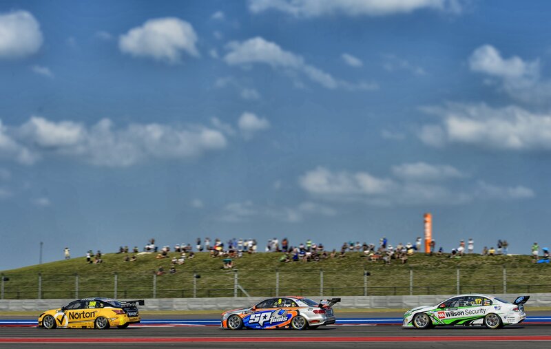 Race cars on a track