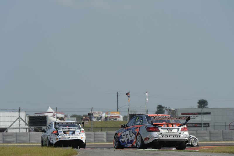 Race cars on a track