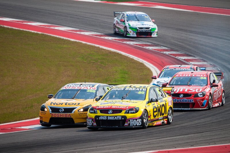 Race cars on a track