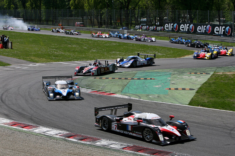 Race cars on a track