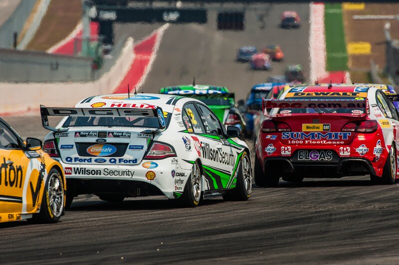 Race cars on a track