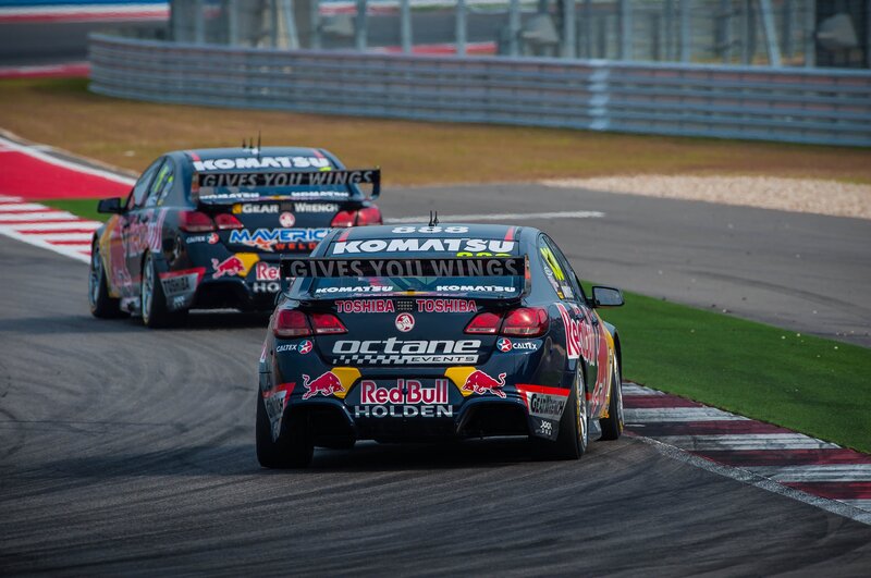 Race cars on a track