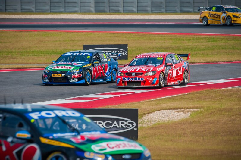 Race cars on a track