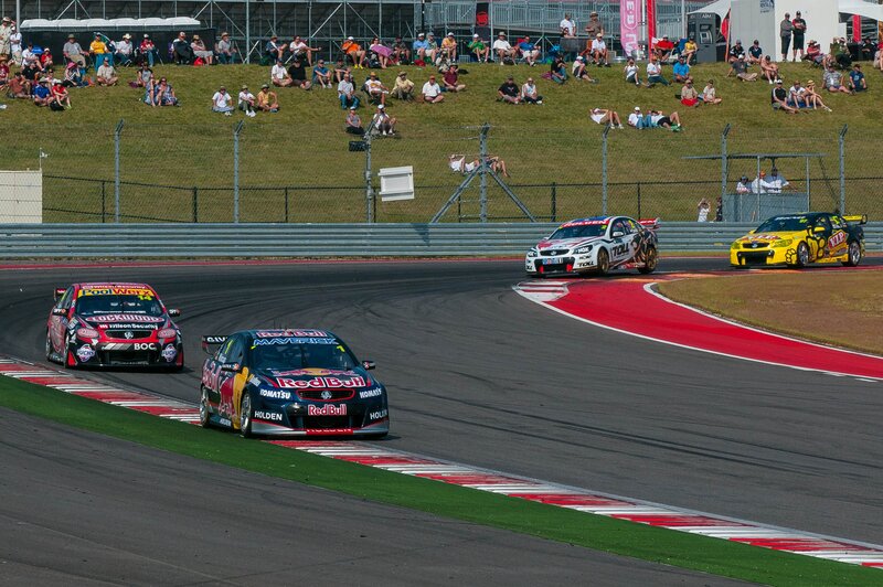 Race cars on a track