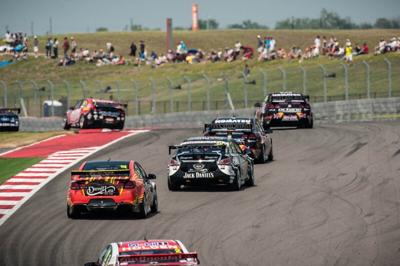 Race cars on a track