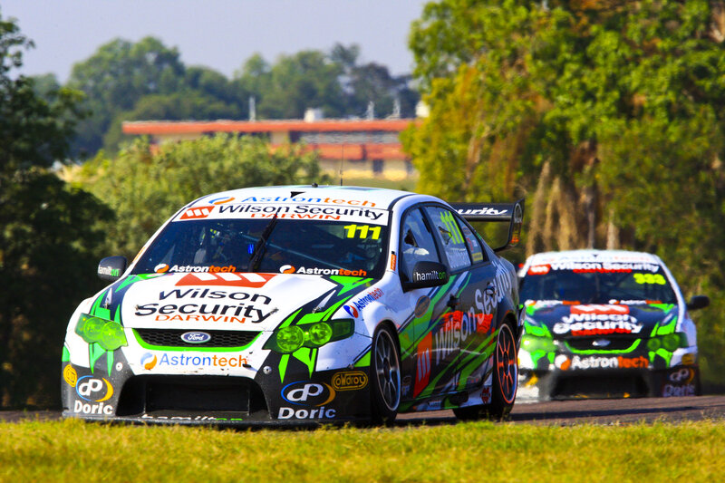 Race cars on a track