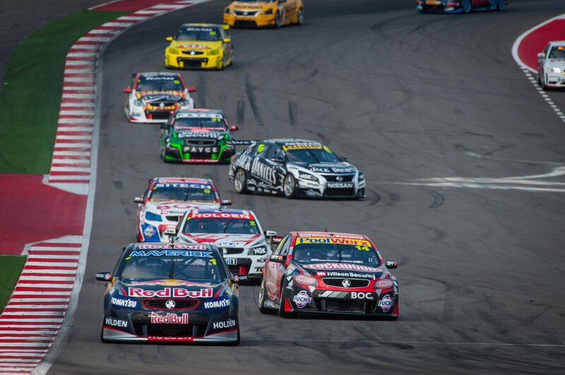 Race cars on a track