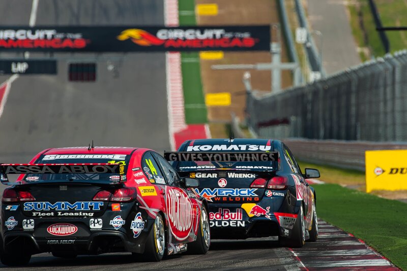 Race cars on a track