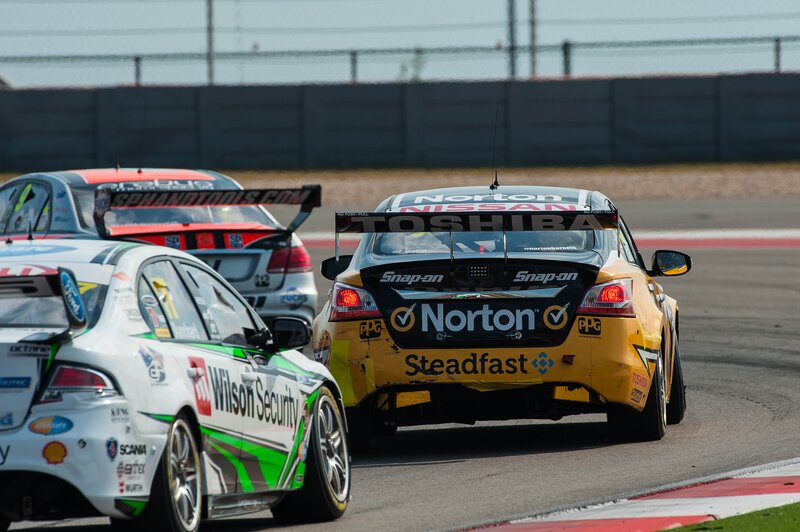 Race cars on a track