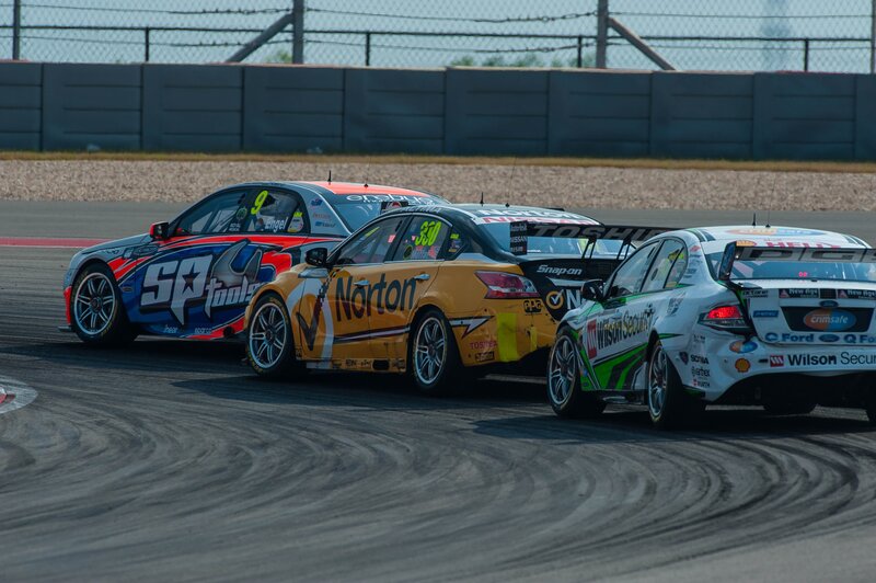 Race cars on a track