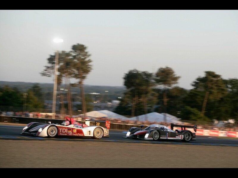 Race cars on a track