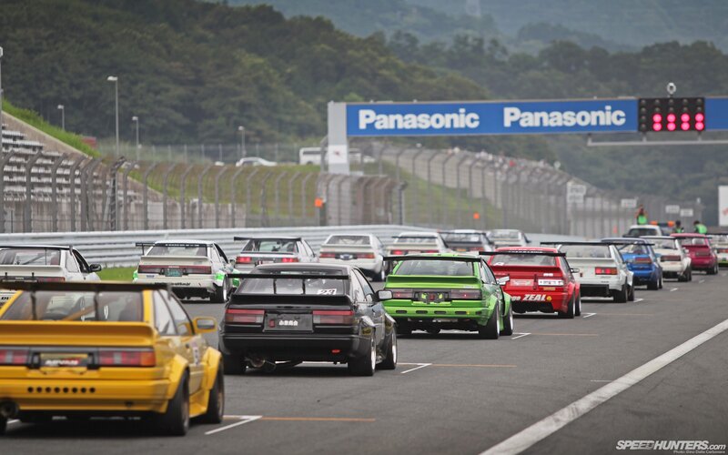 Race cars on a track
