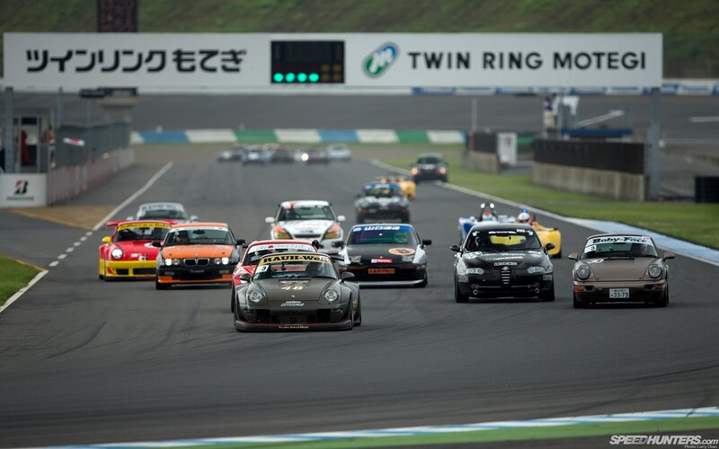 Race cars on a track