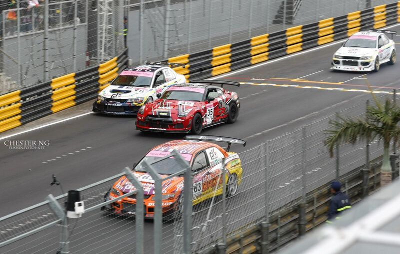 Race cars on a track