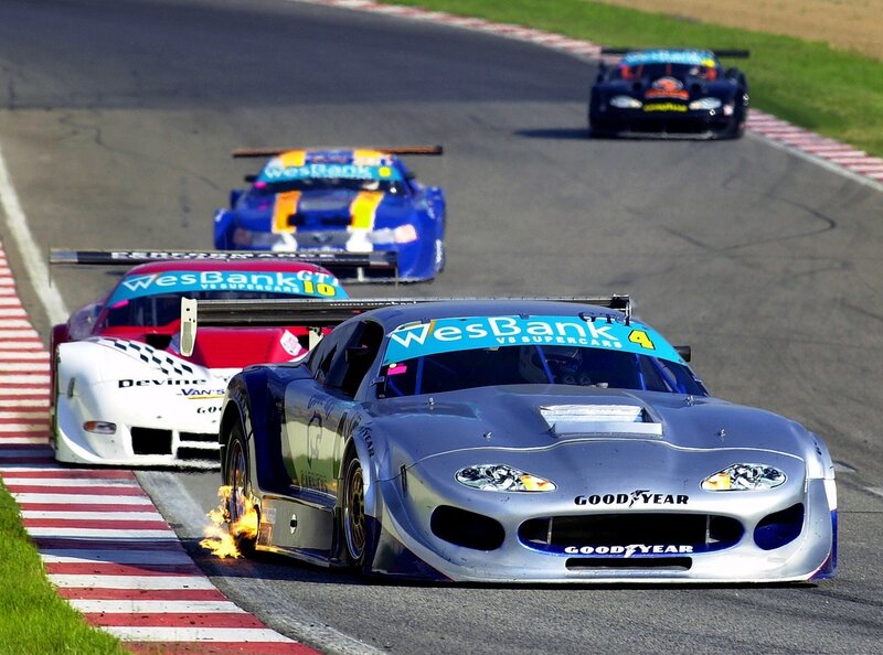 Race cars on a track