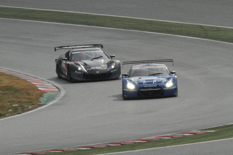 Race cars on a track