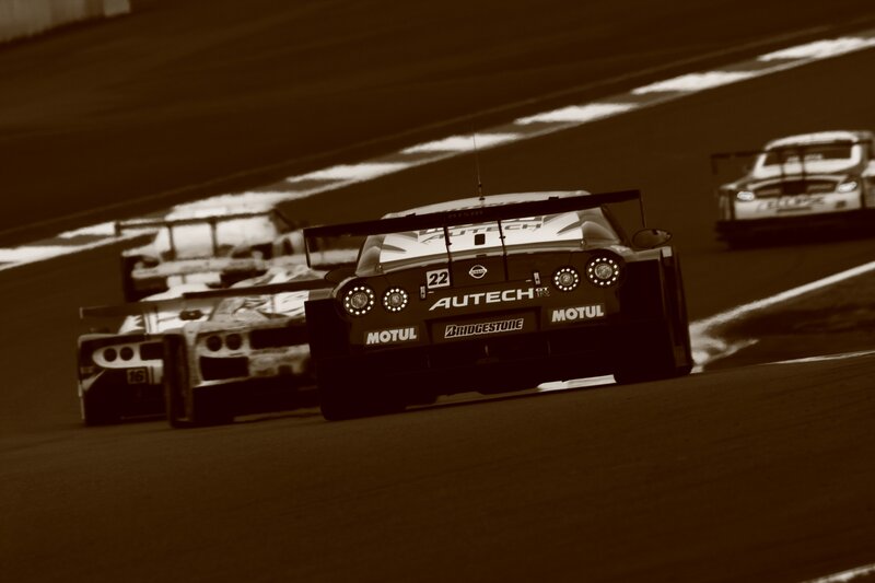Race cars on a track