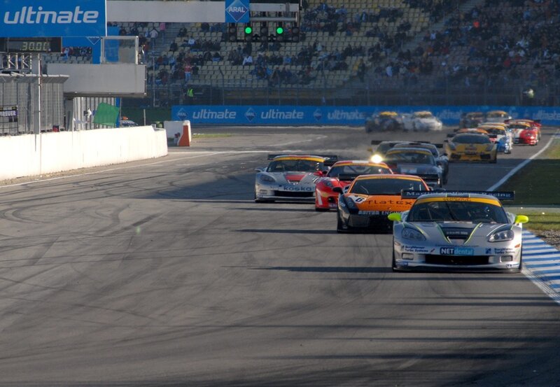 Race cars on a track