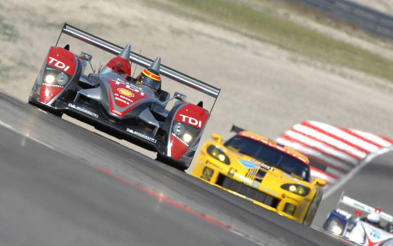 Race cars on a track