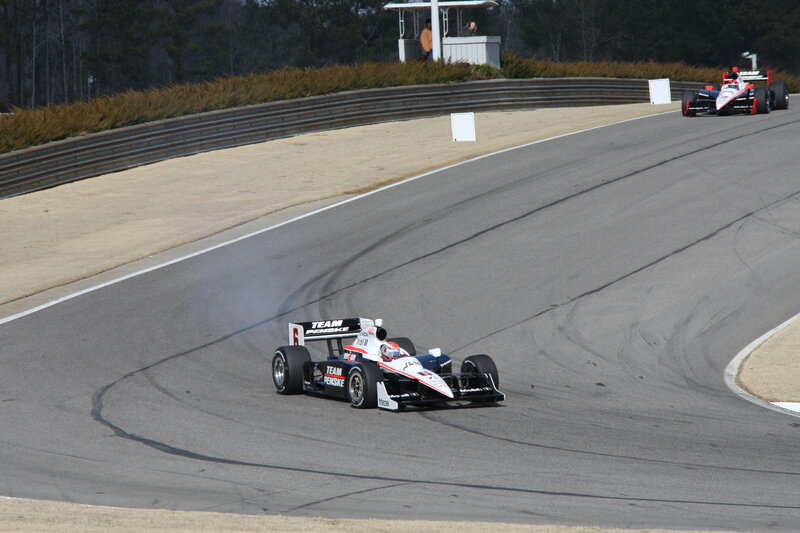 Race cars on a track
